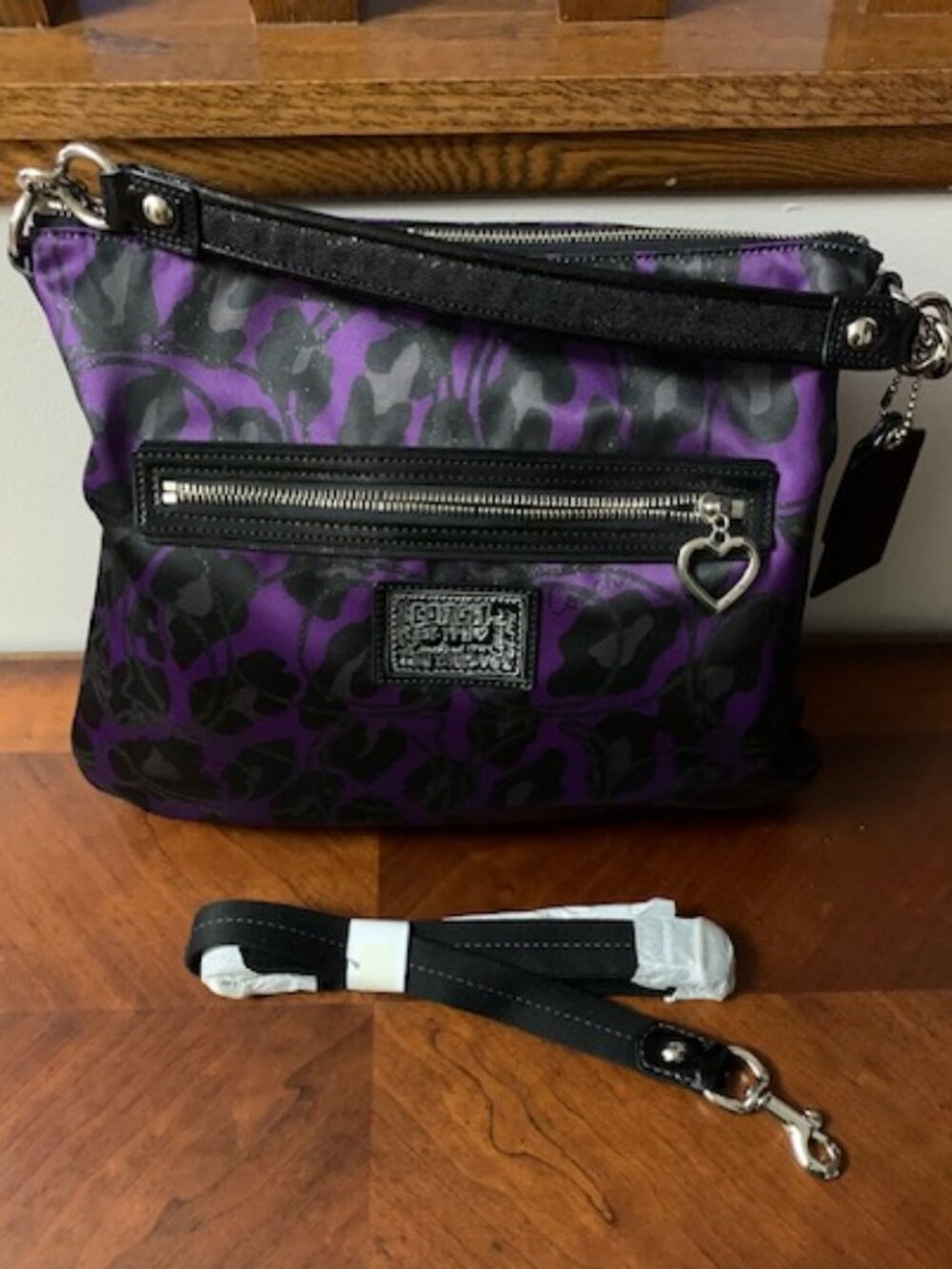 Like New Coach purple Ocelot bag